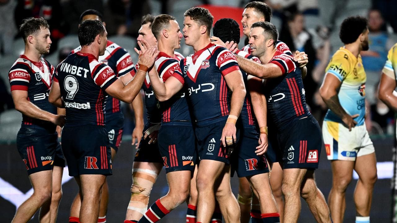 Roosters celebrate.