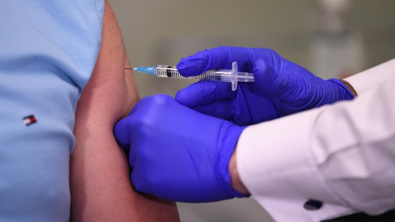 An injection being administered at CSL Melbourne.