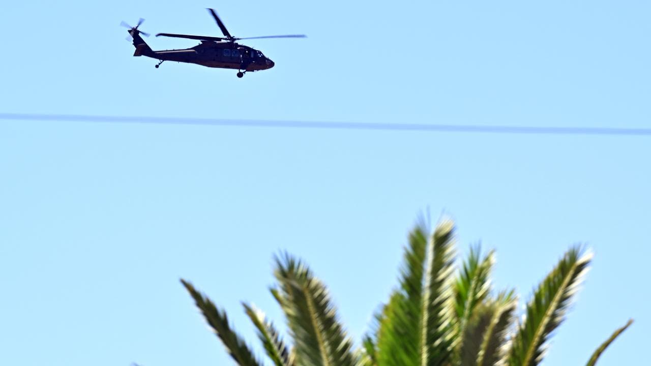 An AH-64 Apache helicopter is seen in Lake Cargelligo, NSW