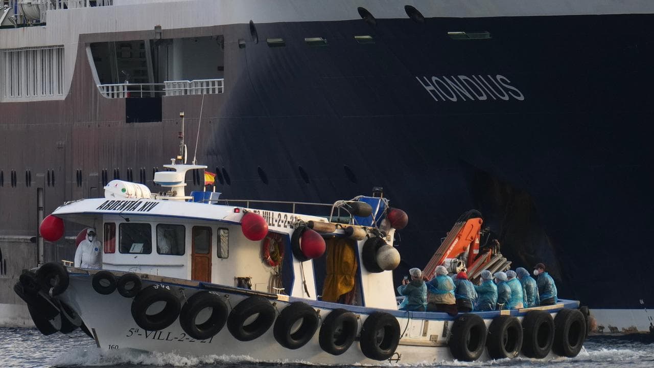 Passengers are disembarked from MV Hondius in Tenerife