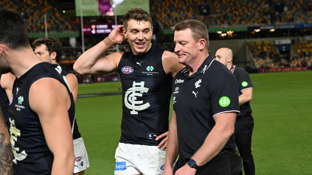 (L-R) Patrick Cripps and Michael Voss.