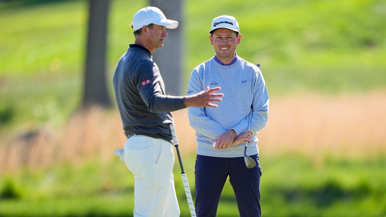 (L-R) Adam Scott with Ben Polland.