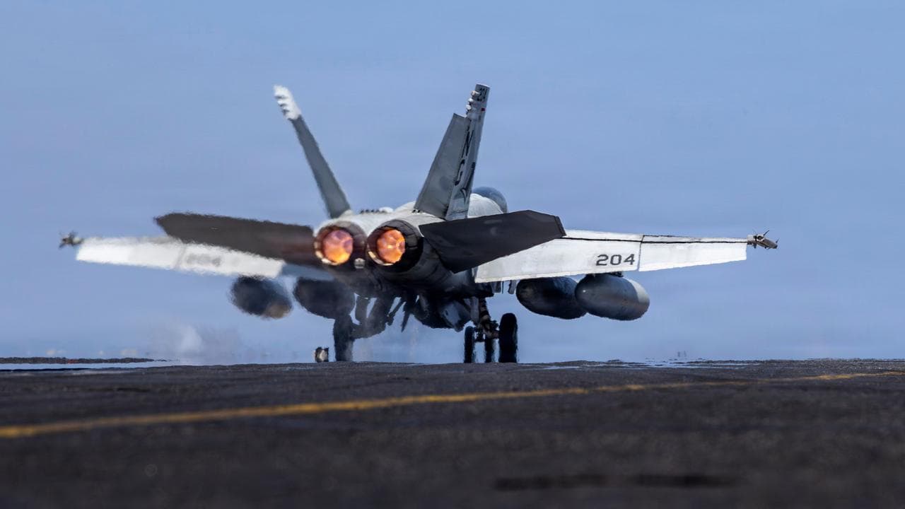 F/A-18E Super Hornet launching from USS Abraham Lincoln