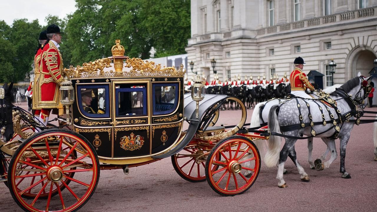 King Charles and Queen Camilla return by coach to Buckingham Palace