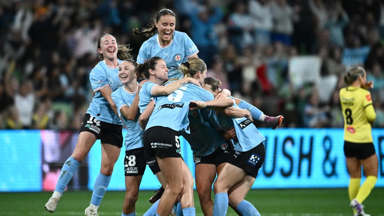 Melbourne City players celebrate.