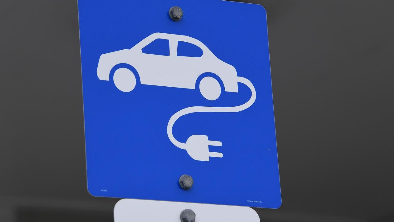 Charging signs at a service station in Brisbane