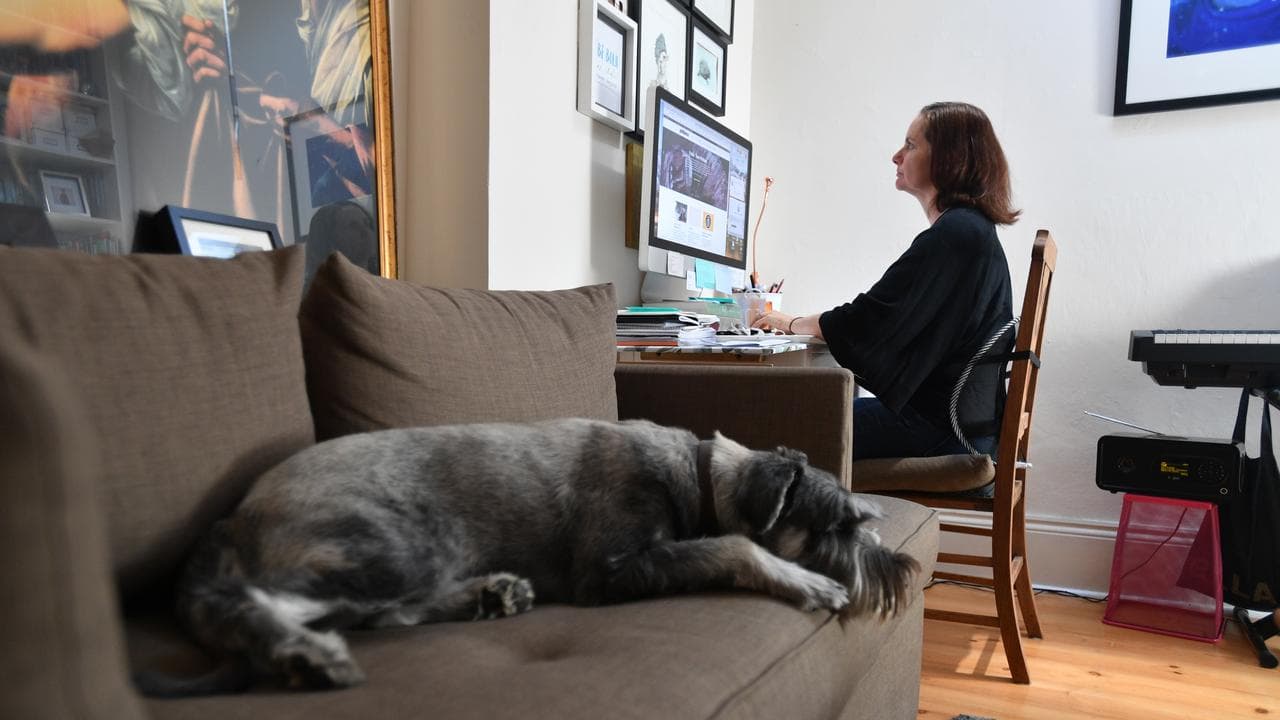 A person working from home during the COVID-19 pandemic.