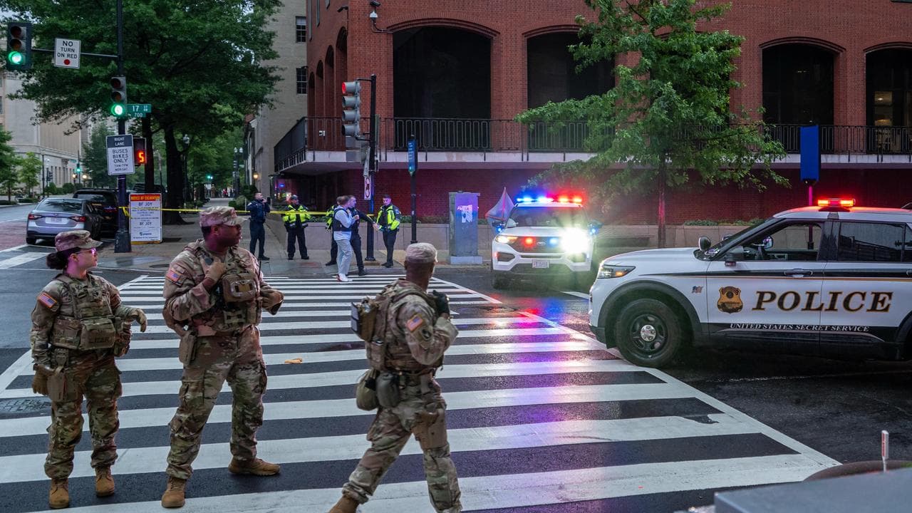 National Guard stand at a perimeter near the White House