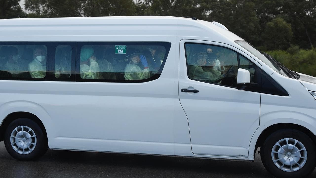 A van carrying Australian travellers to a Perth quarantine facility.