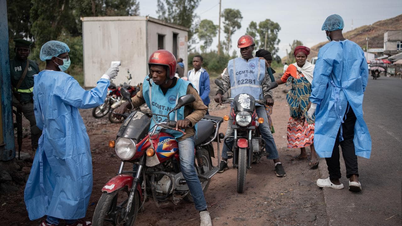 Health workers test for Ebola
