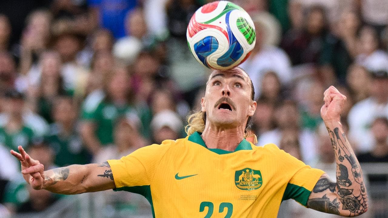 Australia’s midfielder Jackson Irv