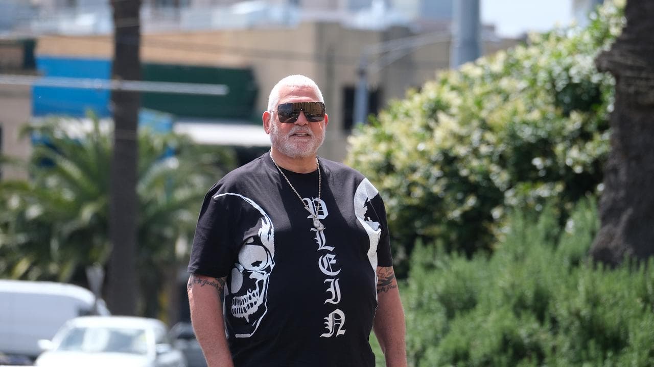 Mick Gatto in t-shirt and sunnies