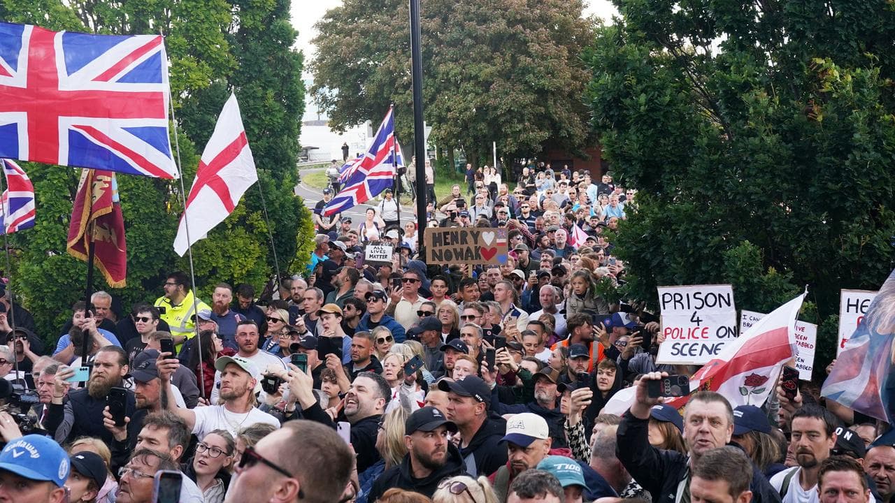 People gather to protest outside Southampton police station, England