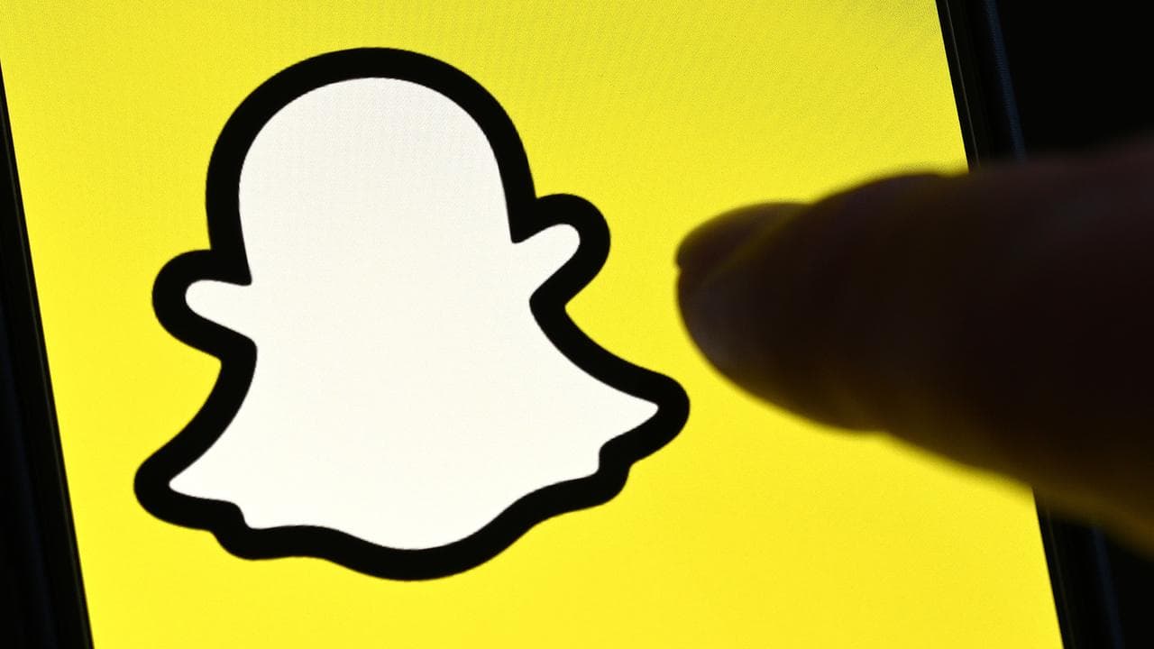 A Snapchat logo on a phone (file image)