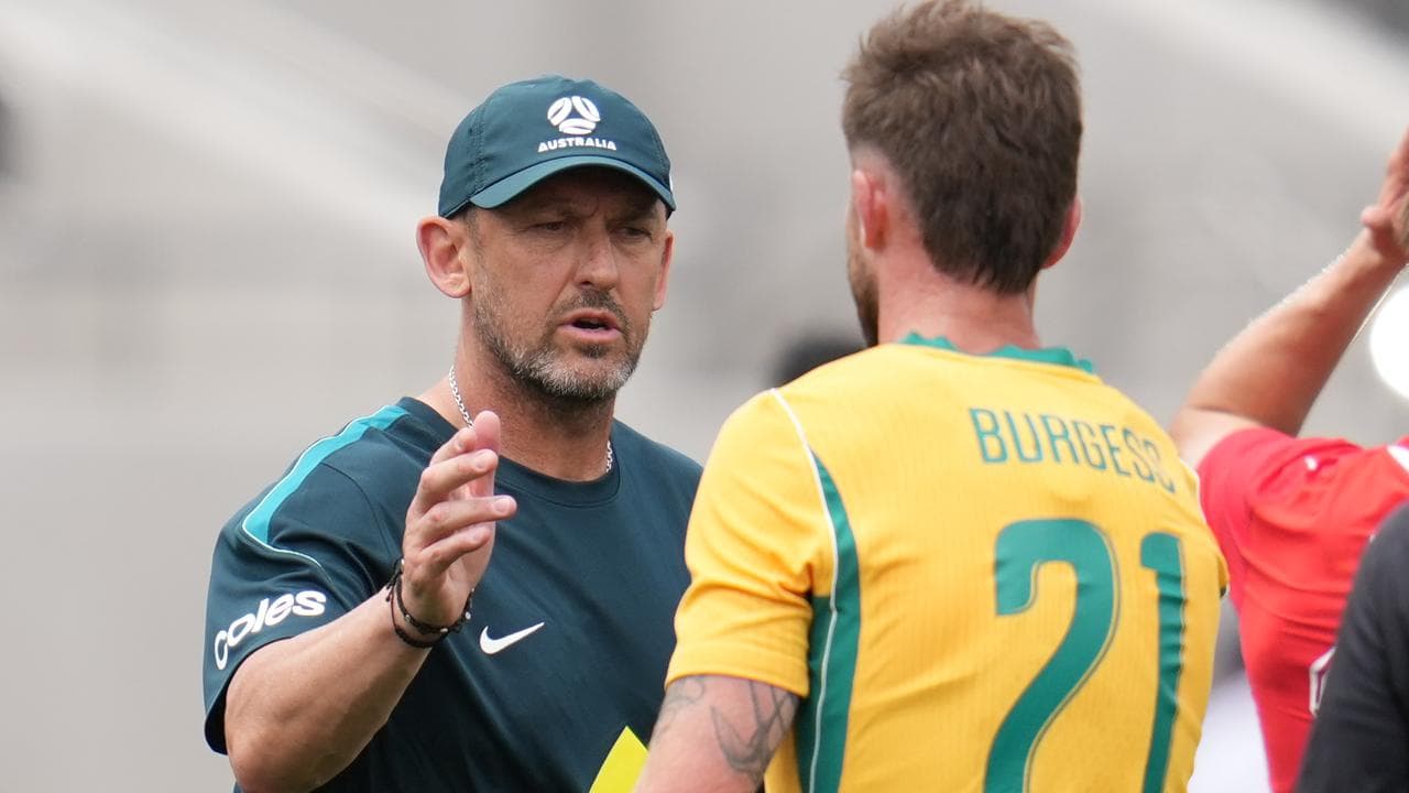 Tony Popovic and Cameron Burgess.