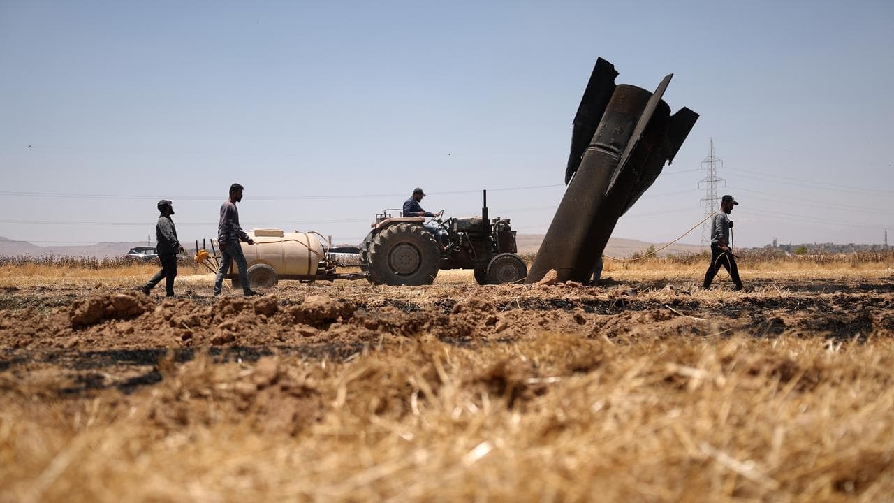 Debris from an Iranian missile launch near Najha in Syria