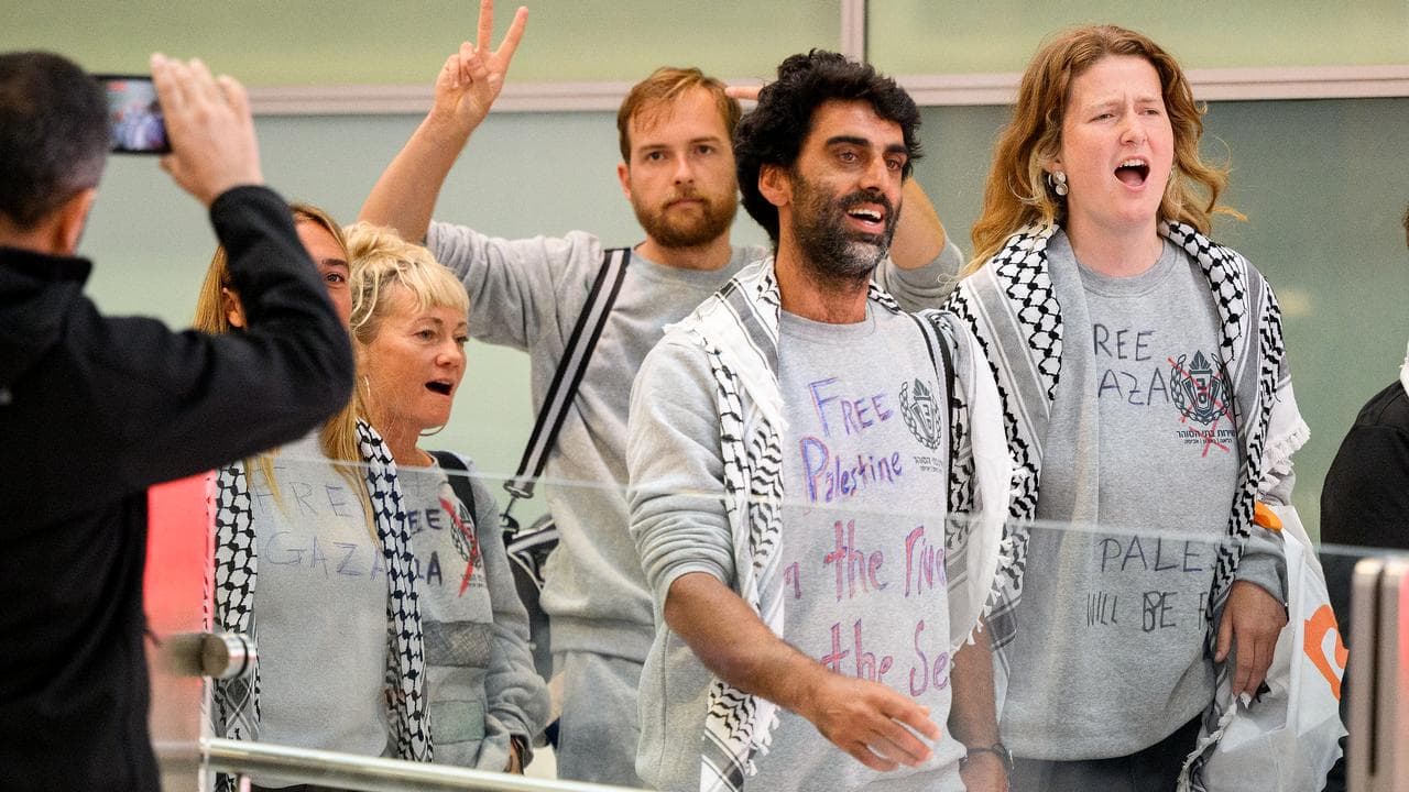 Australian activists return home
