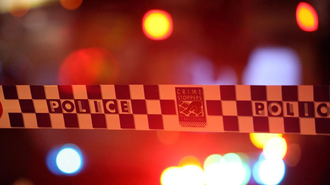 Police at the scene of a fatal shooting 