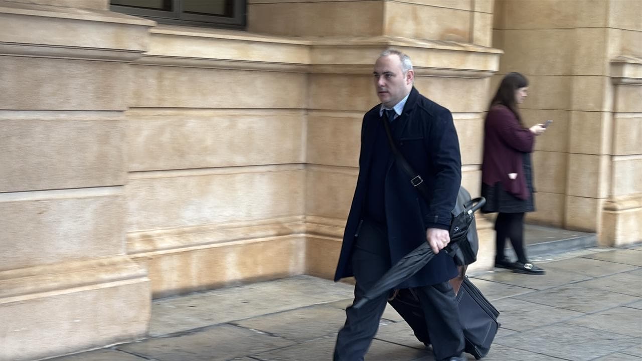Michael Foundas oustide court