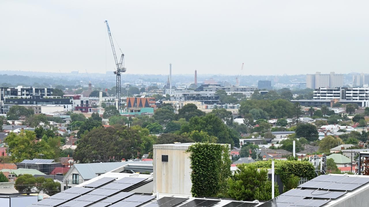 Apartment building with solar panels on roof