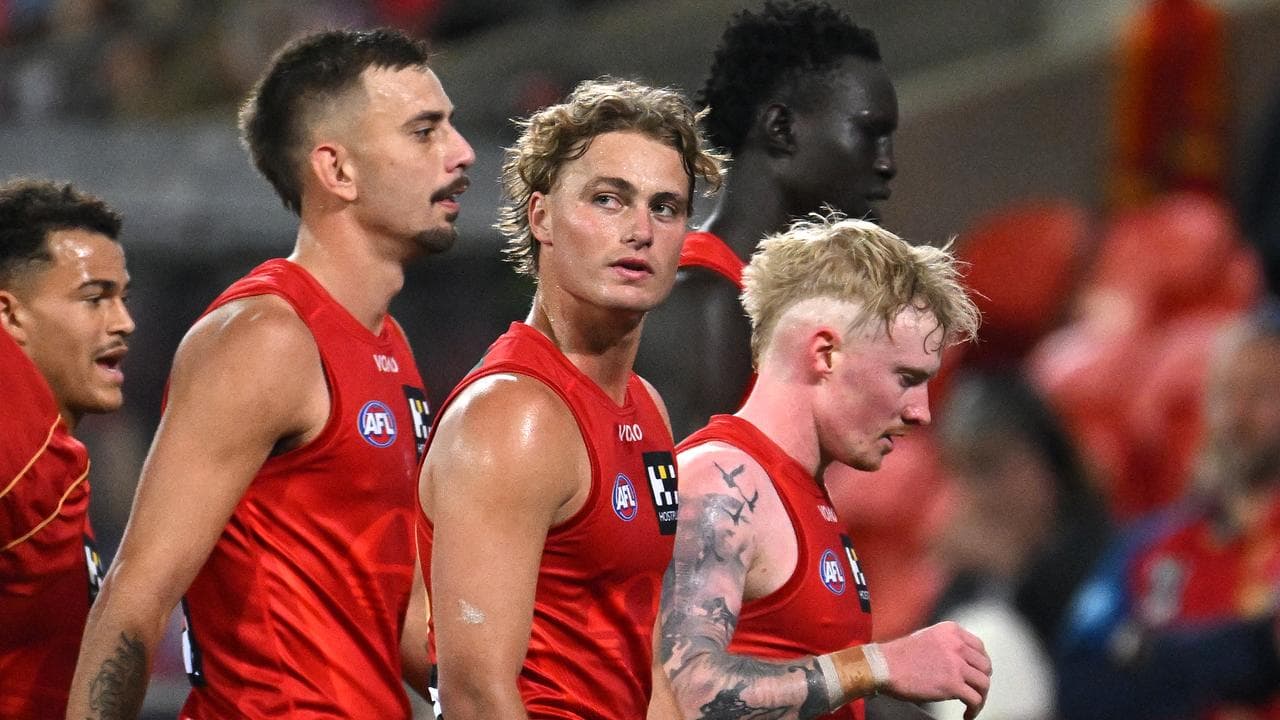 Disappointed Gold Coast Suns players.