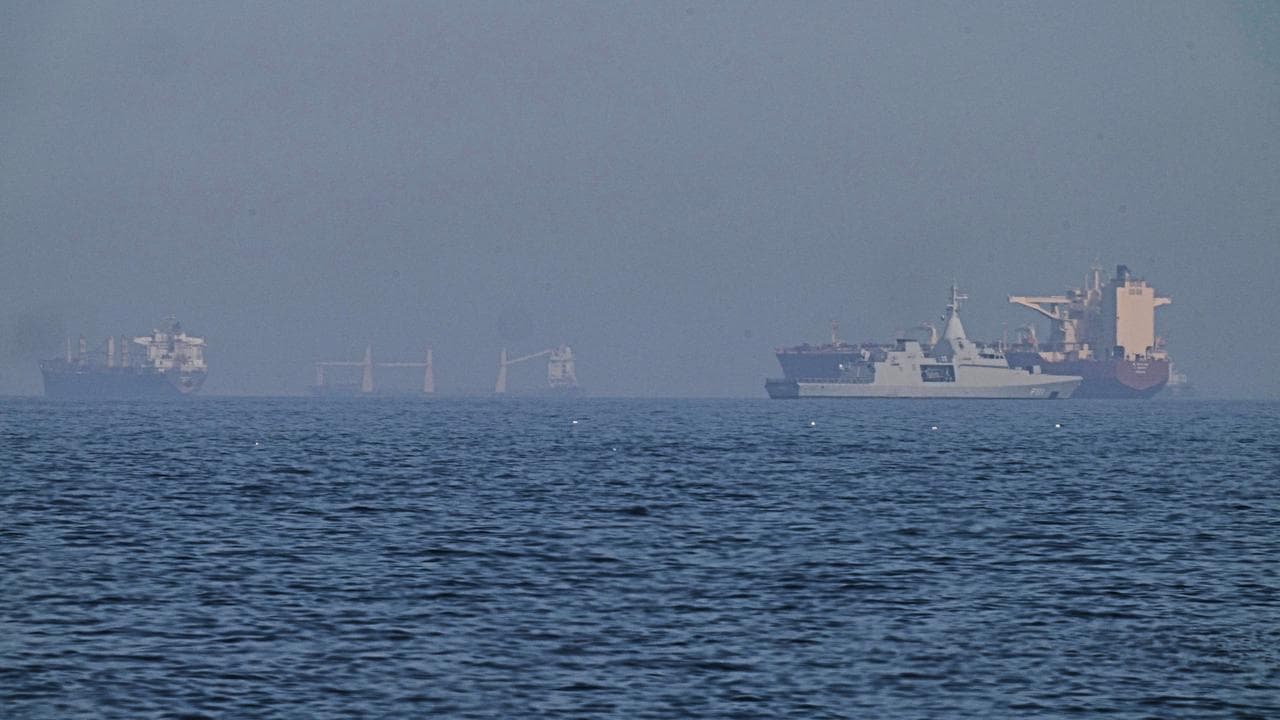 Patrol boat near a tanker near the Strait of Hormuz