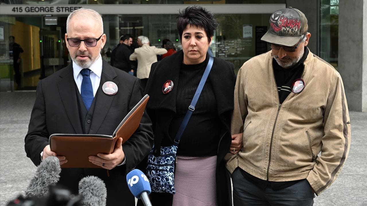 Damien Simonfi (left) read out the family statement