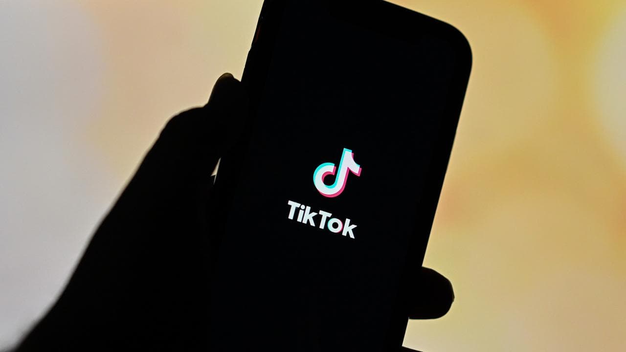 The TikTok app logo is seen on a phone in Melbourne