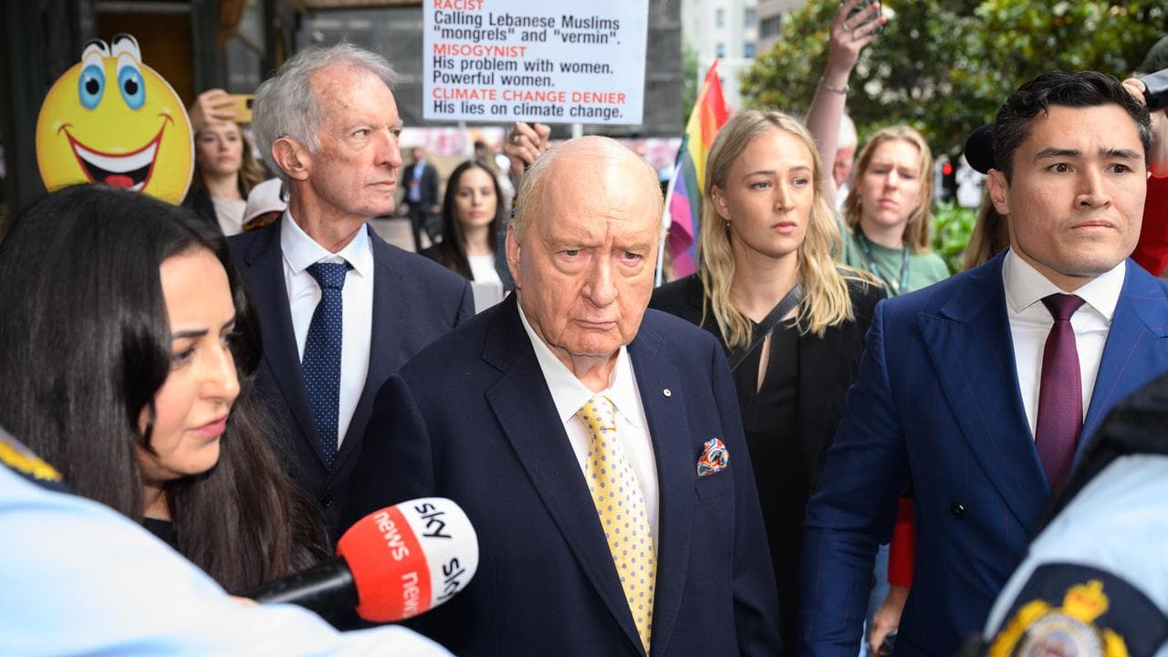 Alan Jones and lawyers (file)