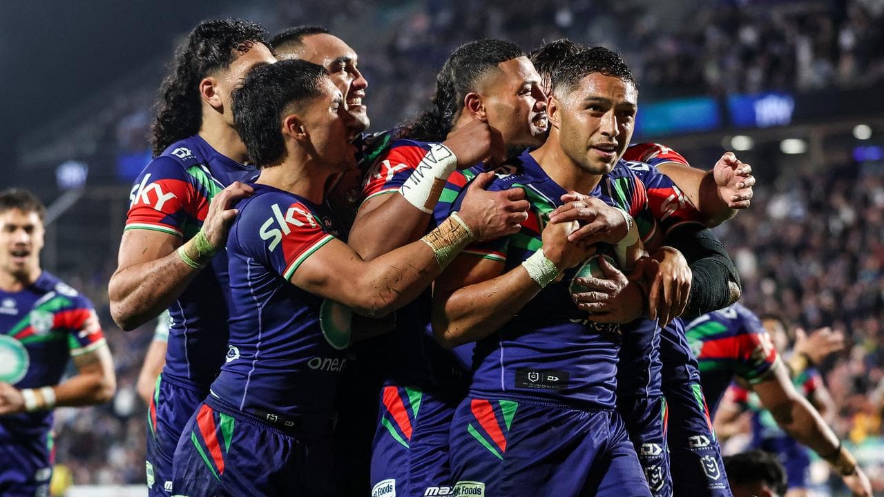 Warriors players celebrate.