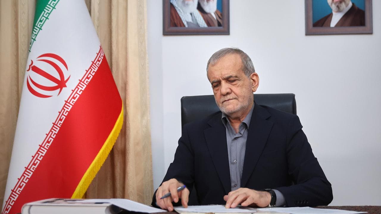 Iranian President Masoud Pezeshkian signs a MOU with the US