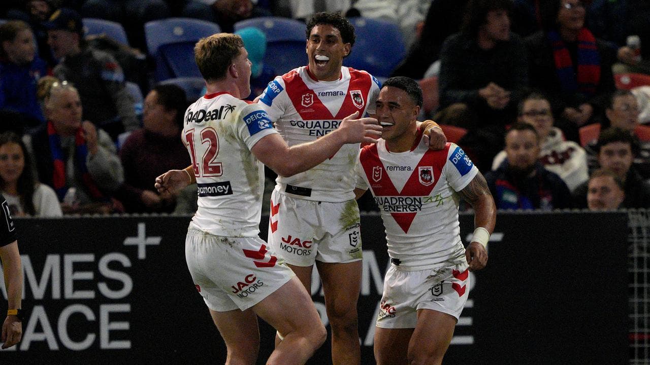 Dragons celebrating after Tyrell Sloan scored a try