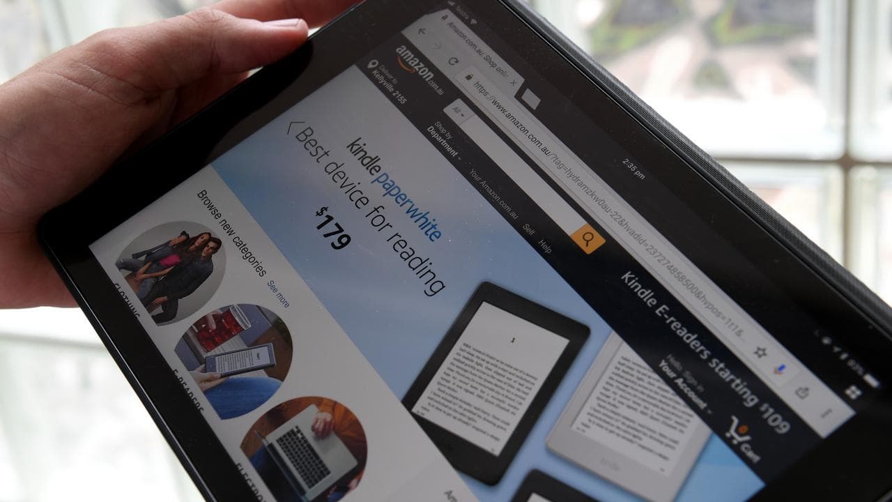 A tablet is seen displaying Amazon's Australian website