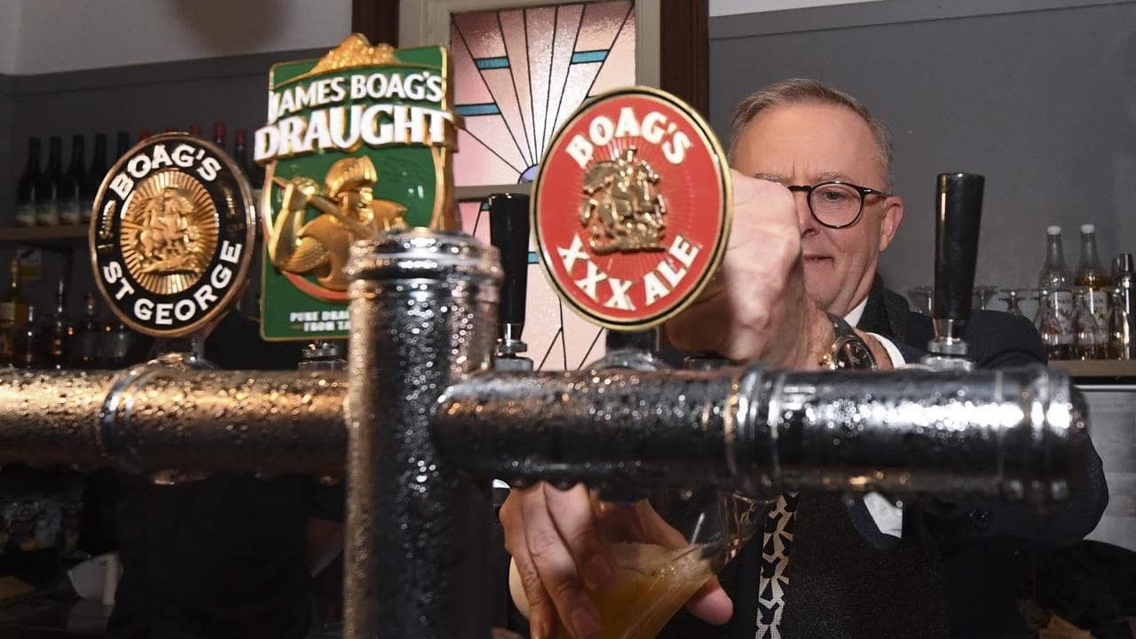 Anthony Albanese pulls a beer during a visit to Boag’s brewery