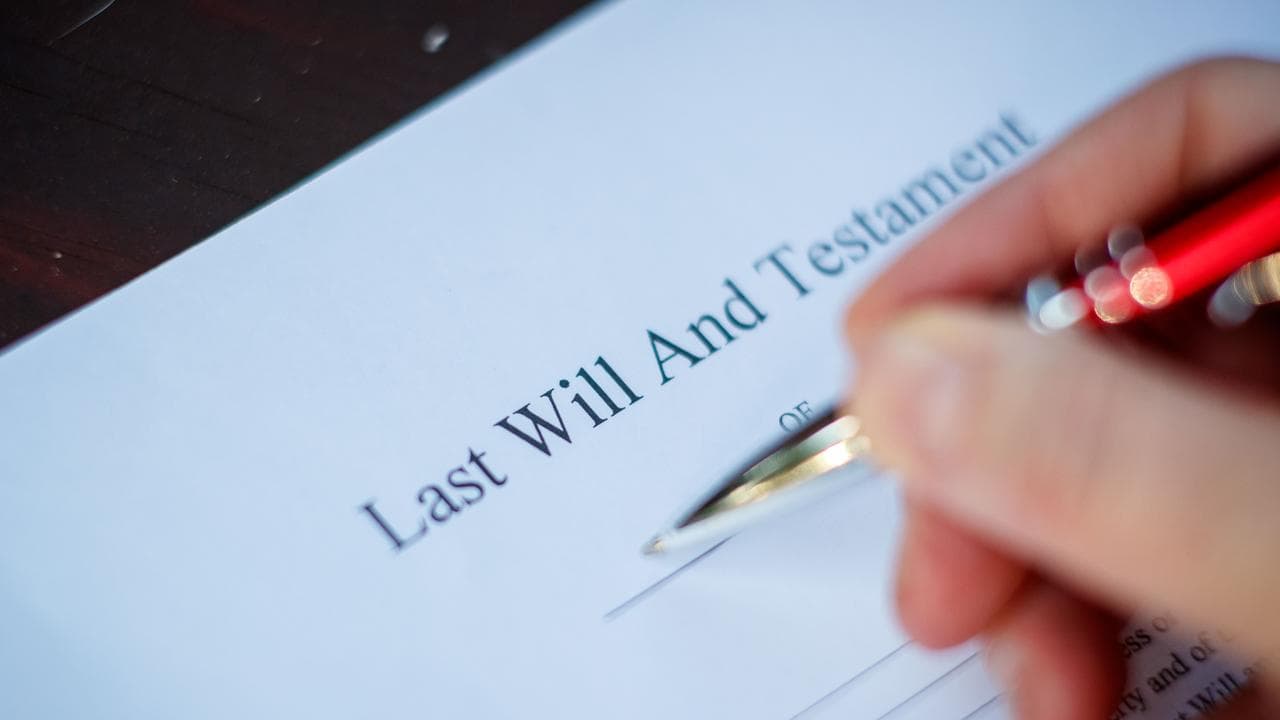 A will being signed (file image)