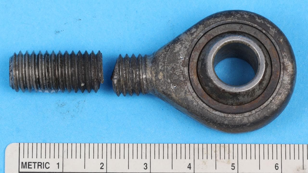 A broken actuator rod from a crashed plane.