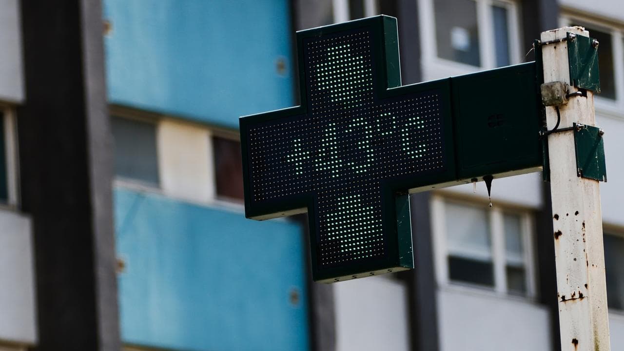 A drugstore sign shows the temperature in Rennes, France