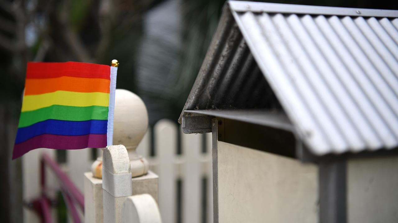 A rainbow flag on a fence in Sydney's inner west.