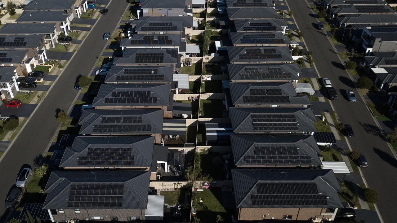 Houses with rooftop solar panels (file image)