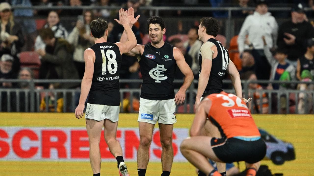 Celebrating Carlton players.