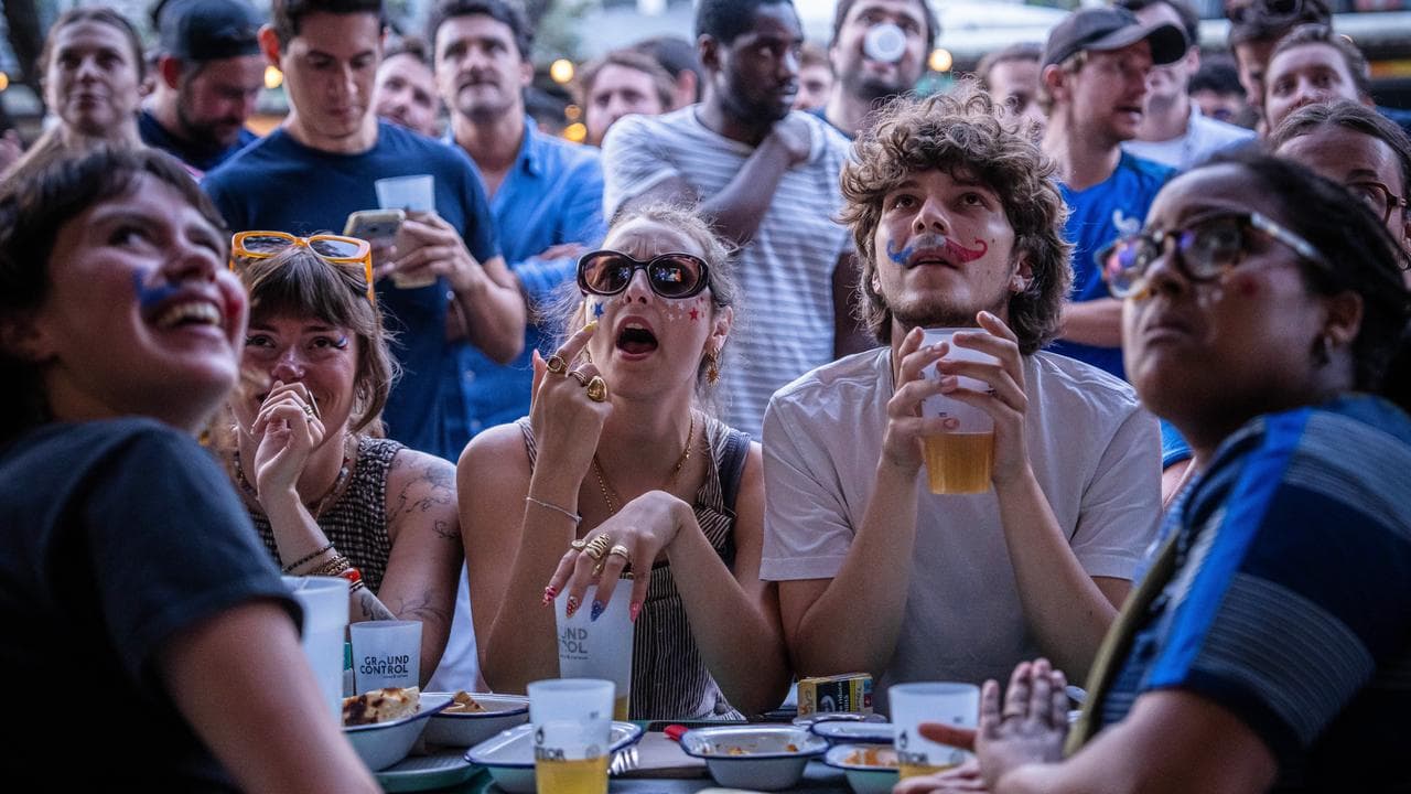 French fans in Paris watch a broadcast of a World Cup match