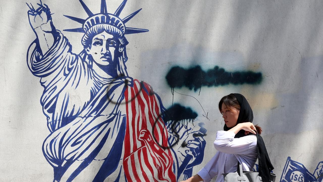 An anti-US mural next to the former US embassy in Tehran, Iran
