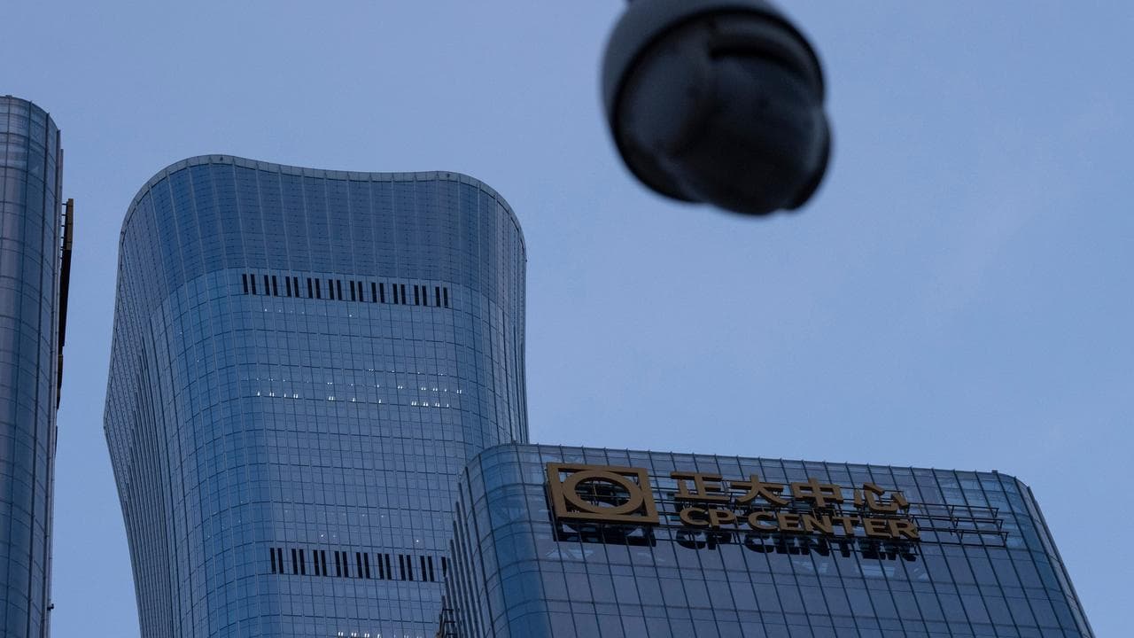 The damaged CITIC Tower after a plane crash in Beijing