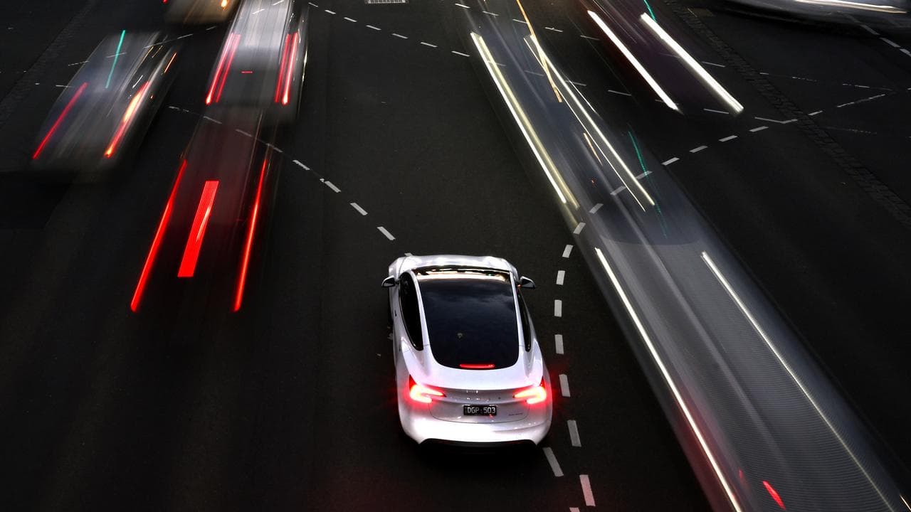 Traffic on road at night