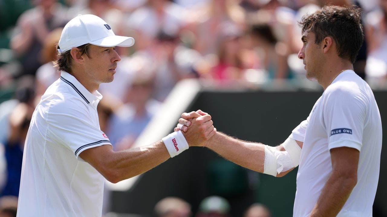 (L-R) Alex de Minaur and Roman Burruchaga.