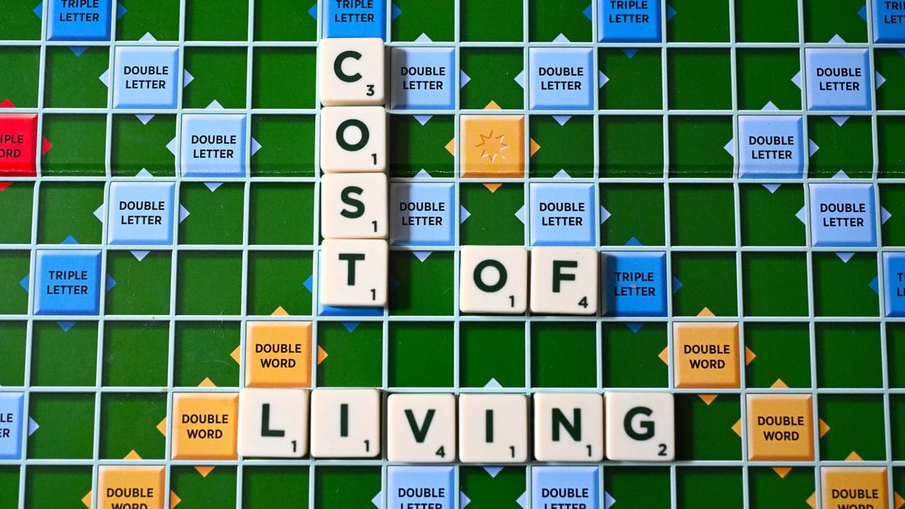 The words ‘Cost of Living’ on a Scrabble board (file image)