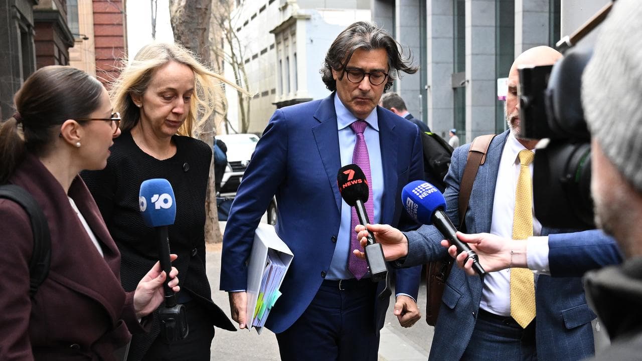 Lawyer Marcus Clarke leaves court