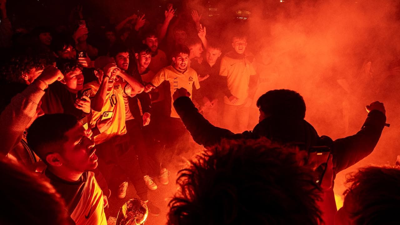 Flares are set off at a World Cup live site in Sydney