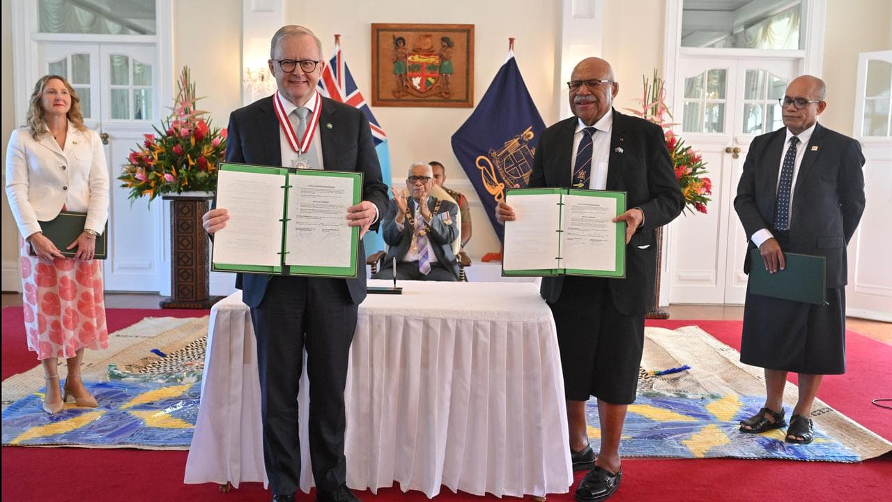 Anthony Albanese and Sitiveni Rabuka sign defence treaty