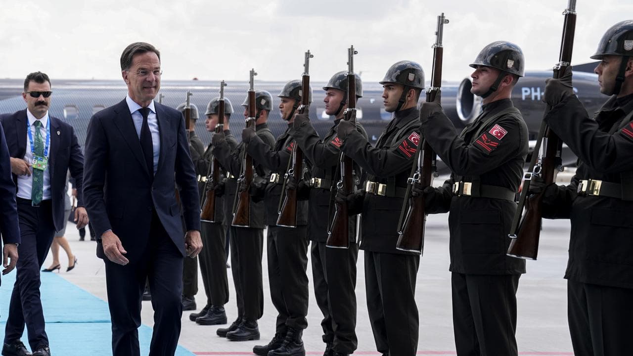Turkish defence official Haluk Gorgun and NATO's Mark Rutte